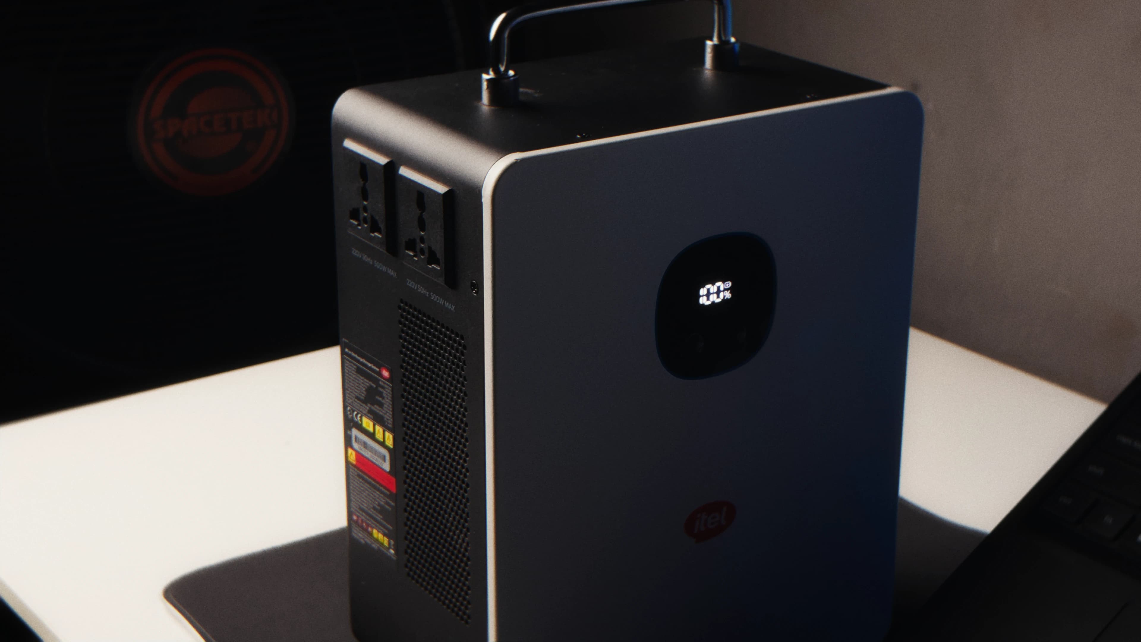 Close-up of the itel PowerTank showing its AC sockets, charging ports and display